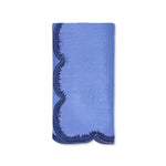 Servilleta de lino azul con bordado de pelitos. marca Zash