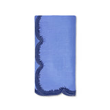 Servilleta de lino azul con bordado de pelitos. marca Zash