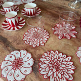 Coasters Identidad en Lino Blanco con Bordado de Biznaga, Paciflora y Dalia Rojas. Set de 4