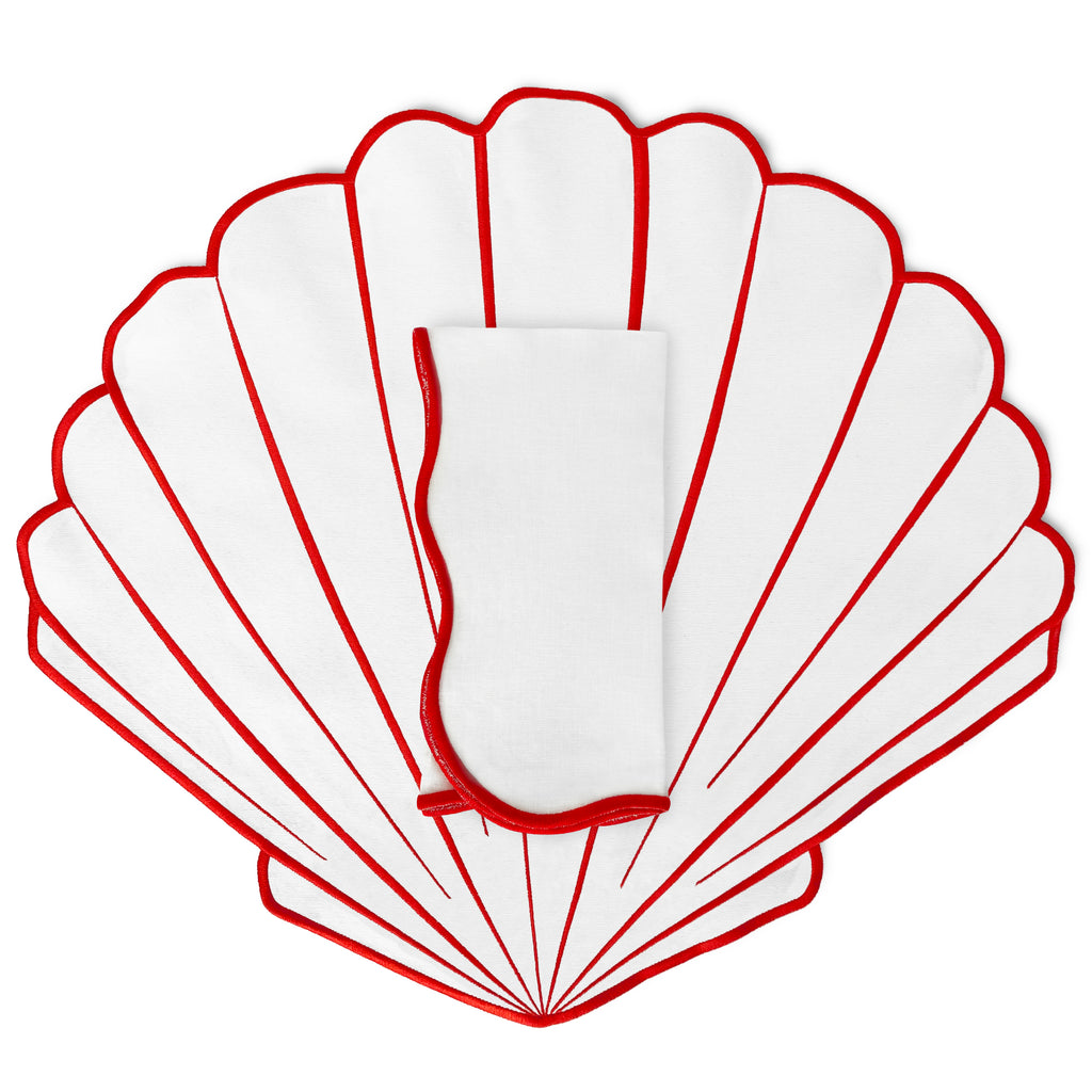 Set mantelería de individual en forma de concha blanco con orilla bordada en rojo y servilleta marca Zash. Perfecto para mesas de playa y mar 