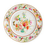 Plato trinche de porcelana con motivos de flora y fauna en colores y bordes con oro, de la colección Paco Real de Vista Alegre