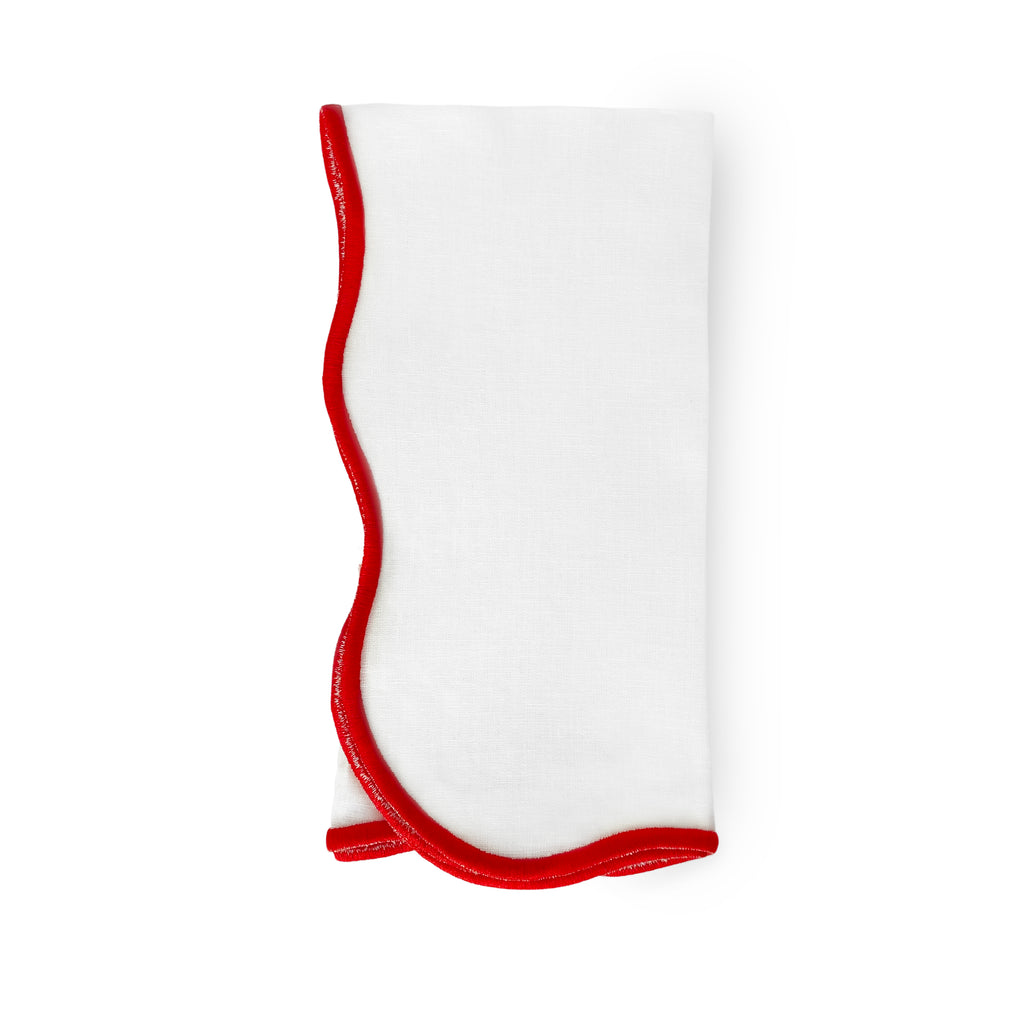 Servilleta Goddess de lino blanco con orilla bordada en ondas en rojo marca Zash 