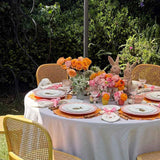 THE EASTER BUNNY ZASHPACK: Set con 4 Individuales Pily en Algodón Naranja con Bordado de Florecitas, 4 Servilletas Easter en Lino Ivory con Bordado de Conejo y 4 Platos para Ensalada con Conejo