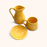 THE YELLOW TEA ZASHPACK: 4 Tazas de Repollo Amarillo Canario, 4 Platos Pan de Repollo Amarillo Canario y 1 Jarra de Repollo Amarillo Canario.