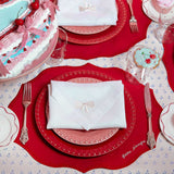 Servilleta en Lino Blanco con Bordado de Moñito Ivory. Set de 4