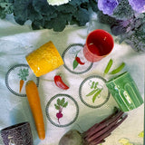 Coasters Veggies en Lino Blanco con Bordado de Verduras. Set de 4