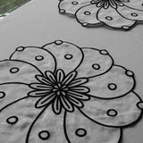 Individuales Identidad en Lino Blanco con Bordado de Biznaga en Negro. Set de 4