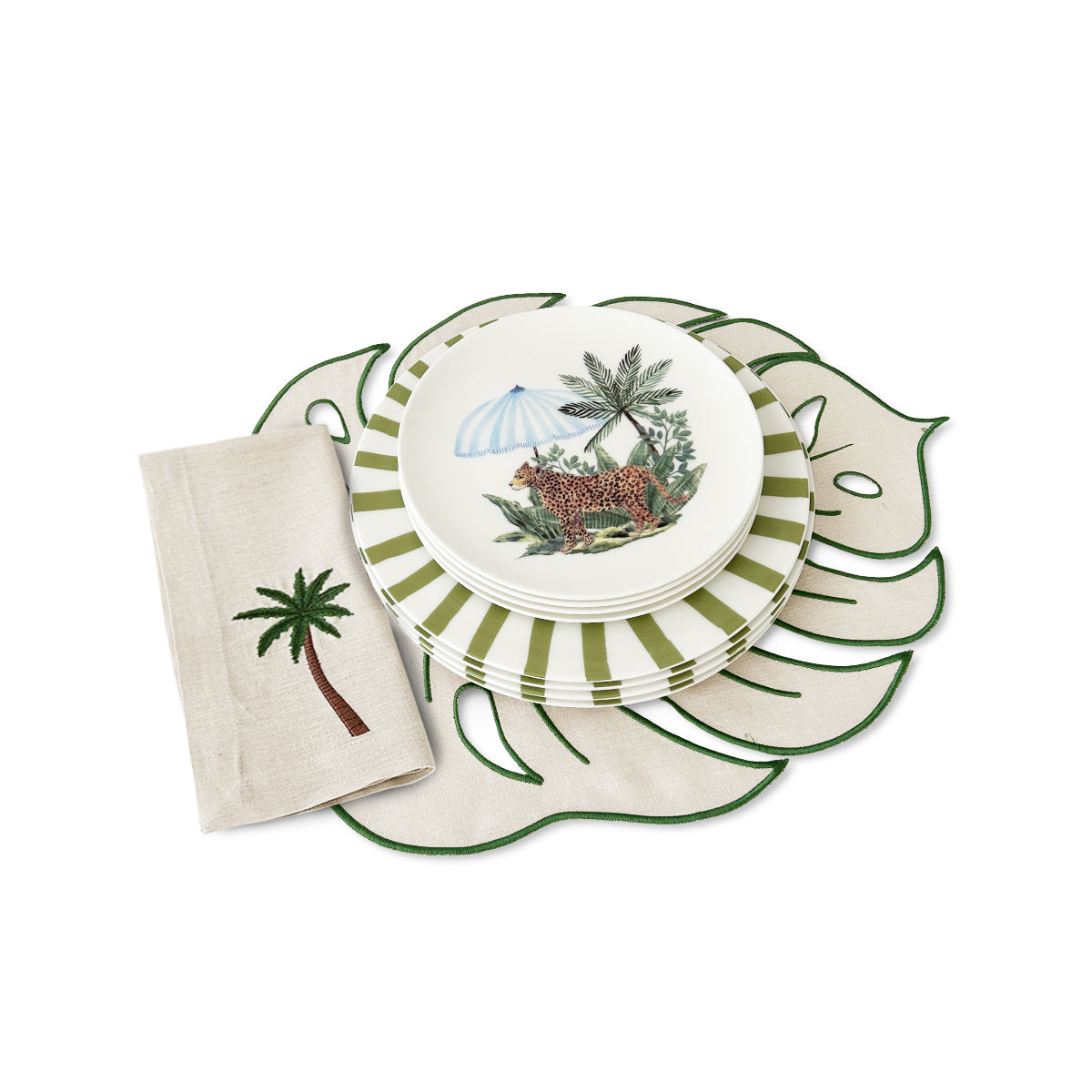 Zashpack colección tropic en verde con mantelería en forma de hoja con palmera, y vajilla verde de cheetah, marca Zash