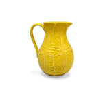 Jarrita de cerámica color amarillo con forma de hojas de repollo, marca Zash