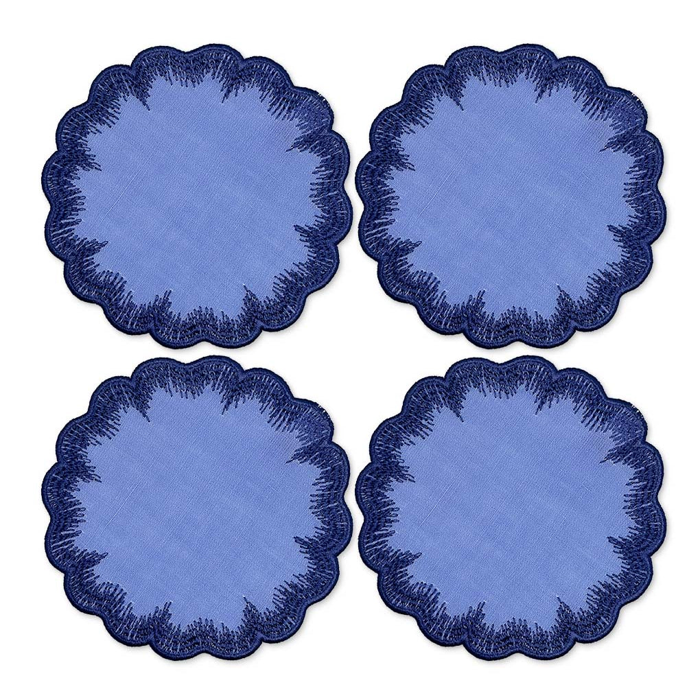 Coasters de lino azul con orilla bordada con pelitos, marca Zash