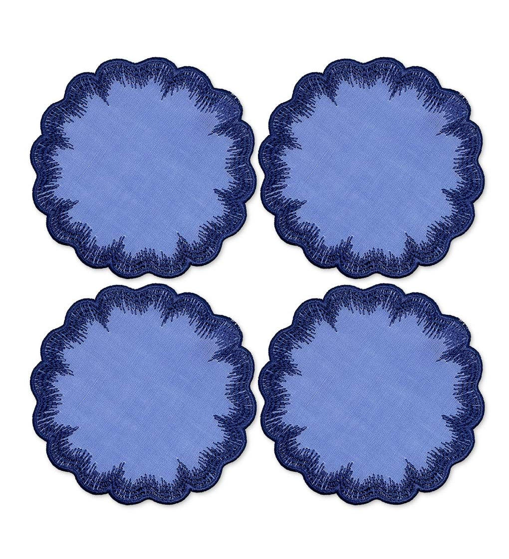 Coasters de lino azul con orilla bordada con pelitos, marca Zash
