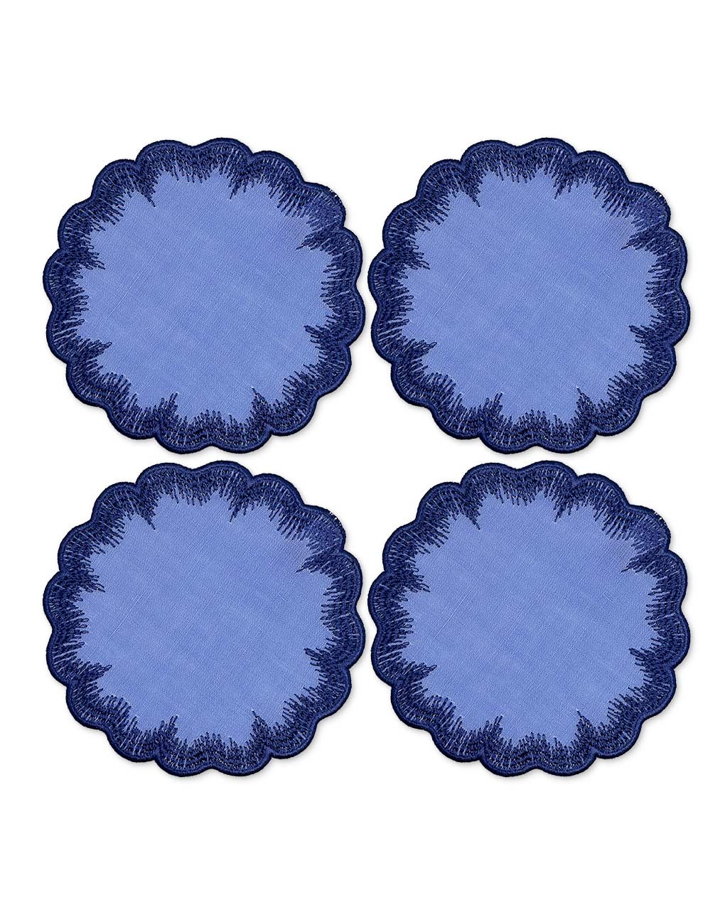 Coasters de lino azul con orilla bordada con pelitos, marca Zash