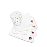 Set con cocteleras de lino blanco con figuras de otoño bordadas, y vasos Pippa con puntitos azules, marca Zash