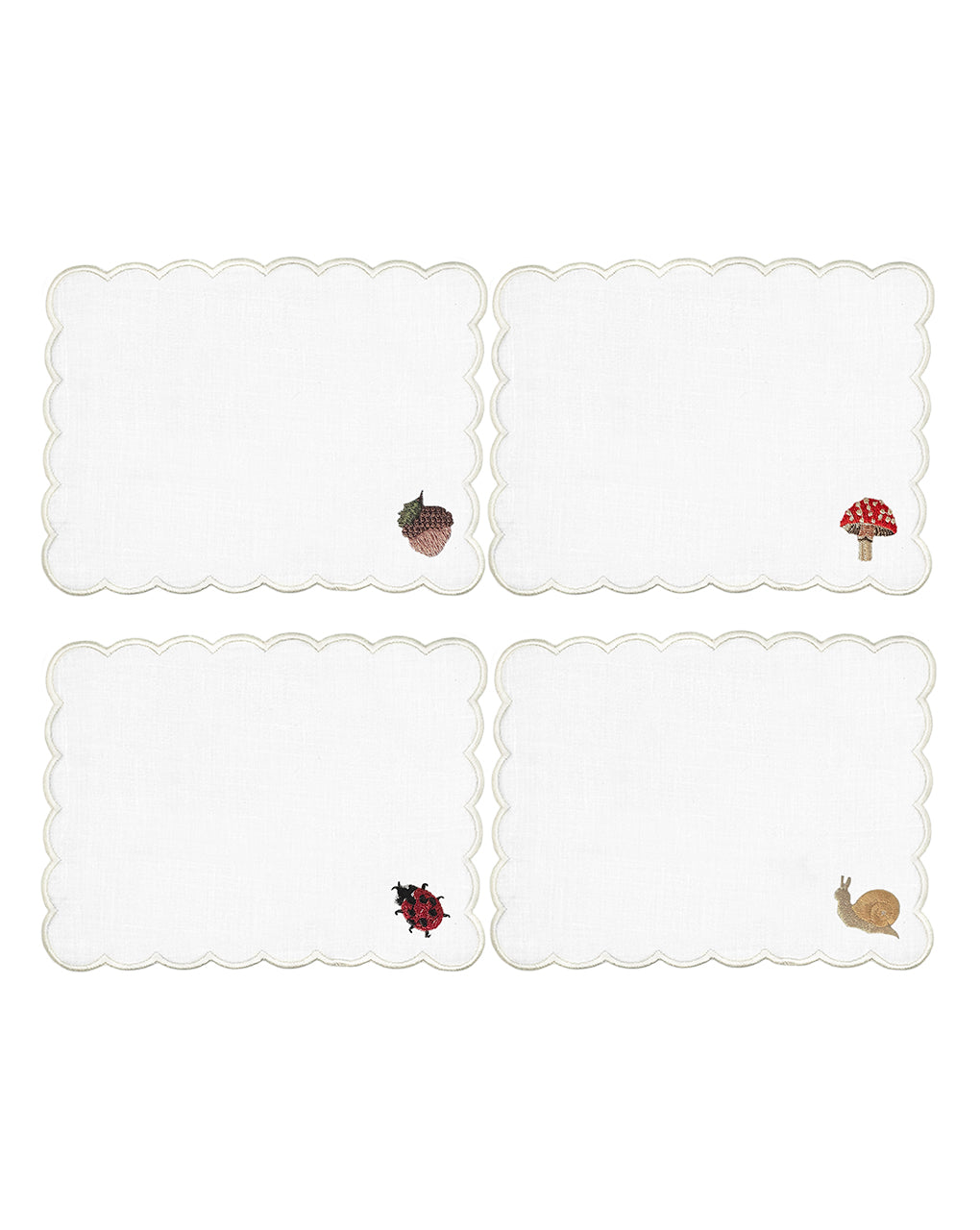 Servilletas cocteleras rectangulares de lino blanco con figuras otoñales bordadas, marca Zash