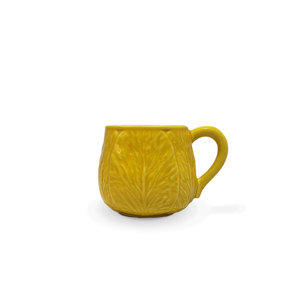 Taza tipo mug para café o té de cerámica en amarillo con forma de hojas de repollo, marca Zash
