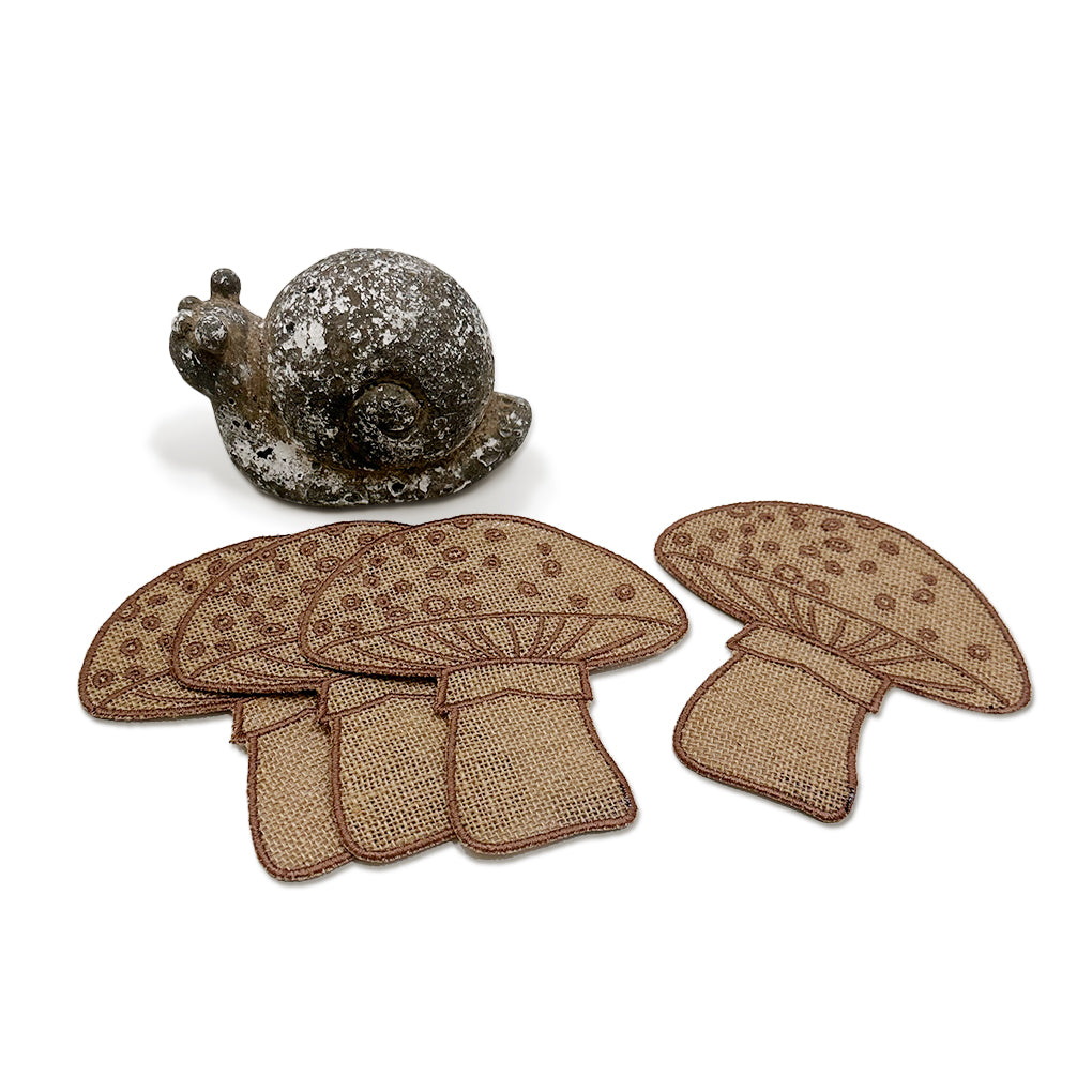 Set con cocteleras de yute en forma de hongo y caracol de decoración de piedra