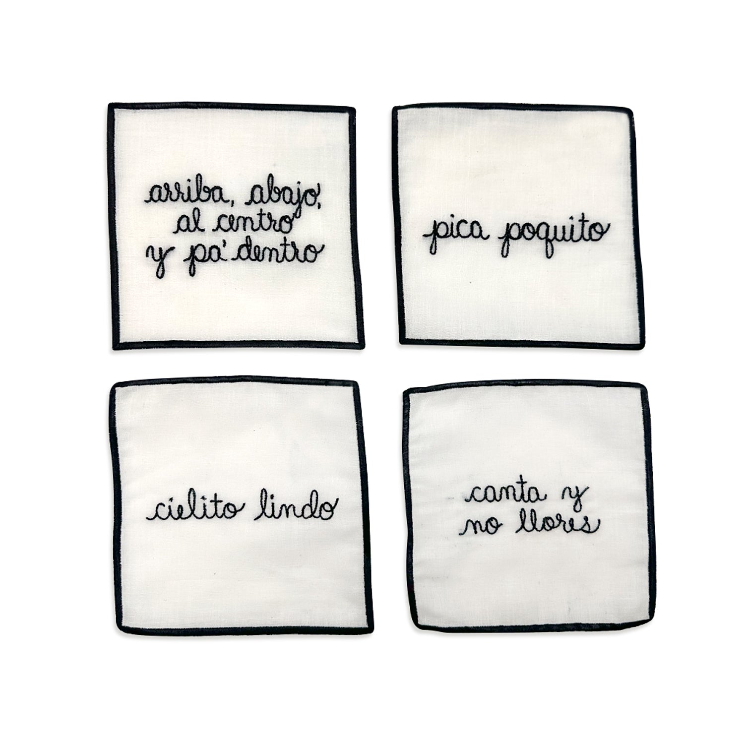 Set con 4 Servilletas Cocteleras en Lino Blanco con orilla y frases típicas Mexicanas bordadas en color negro