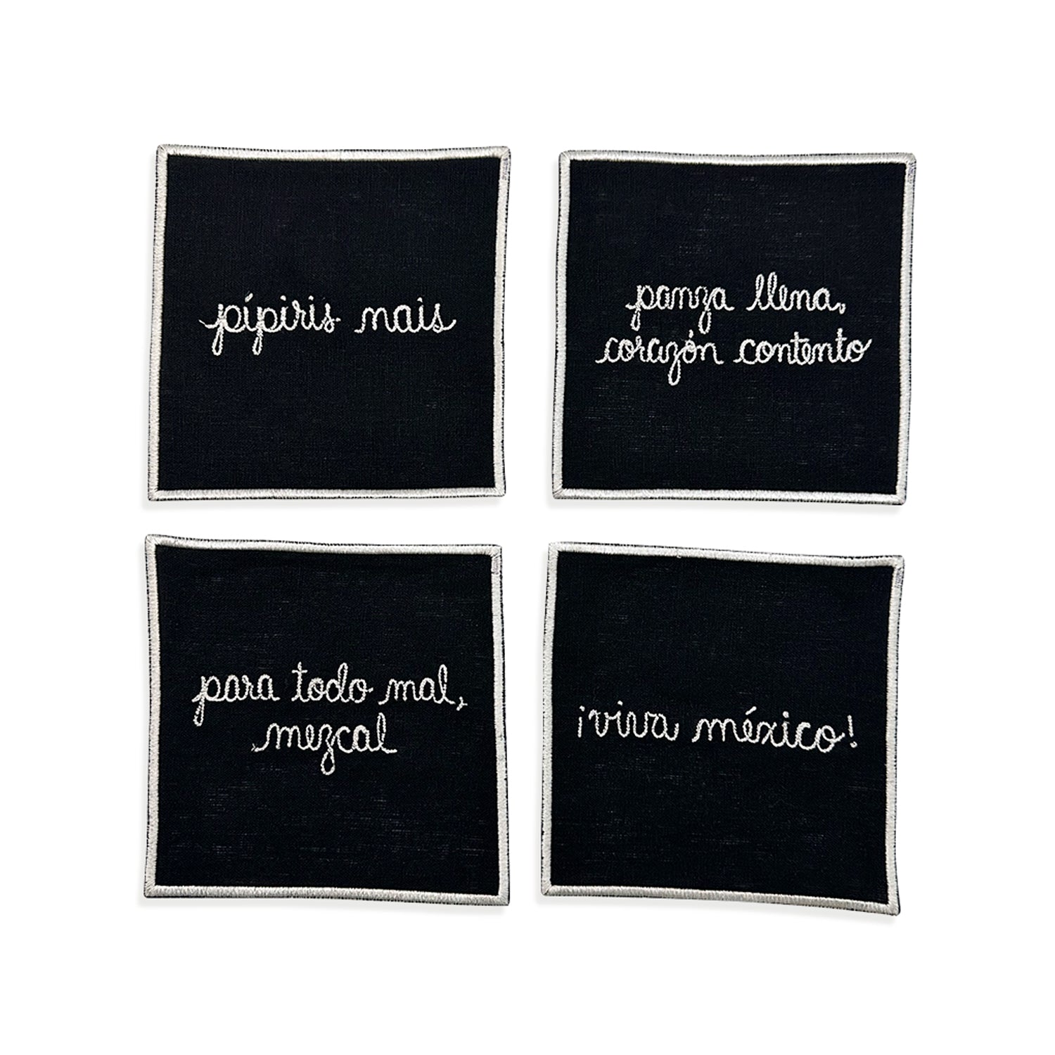 Set de 4 Servilletas Cocteleras en lino negro con orilla y frases típicas mexicanas bordadas en blanco