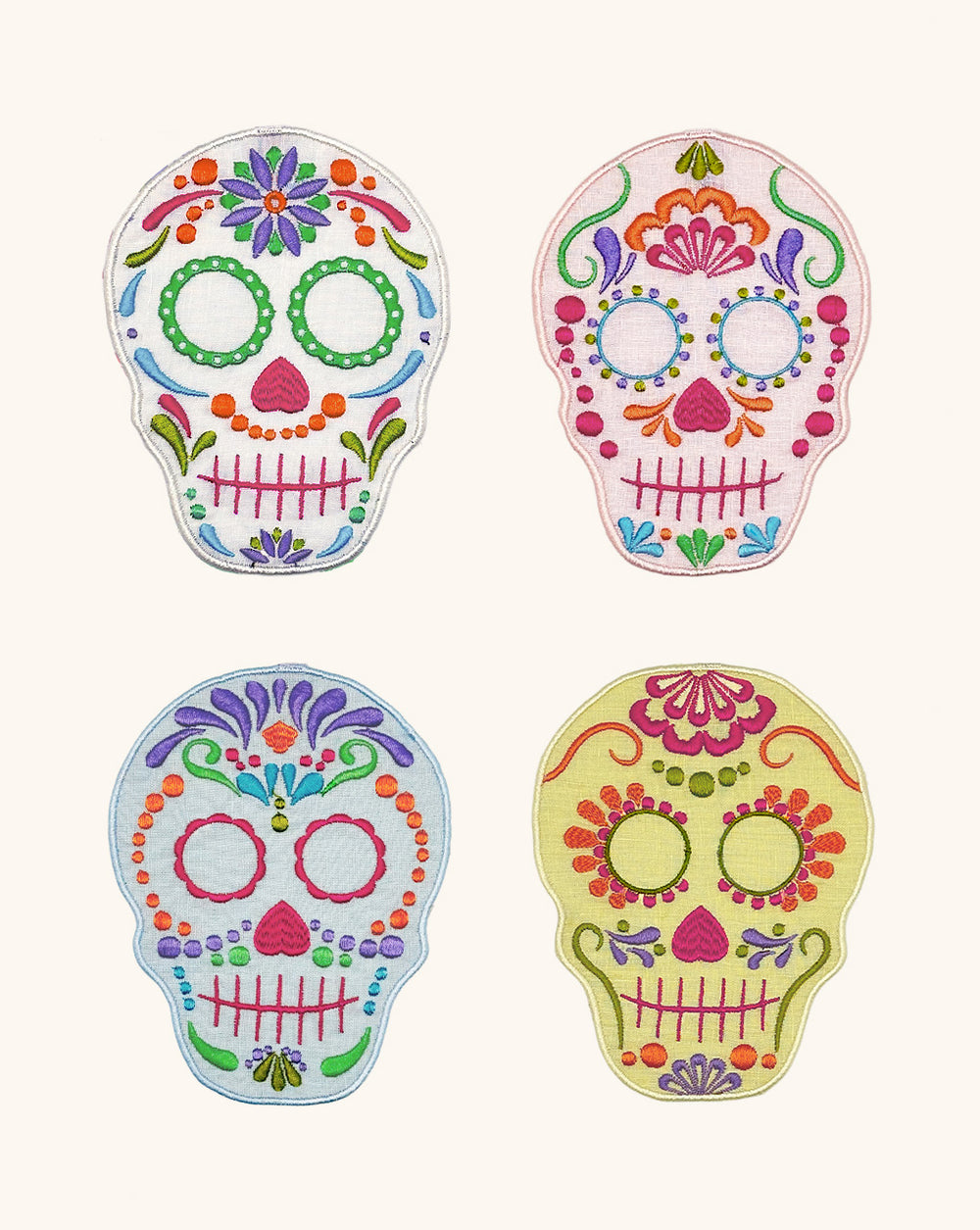 Cocteleras Calaverita de Azúcar en Lino de Blanco, Amarillo, Rosa y Azul con Bordado de Colores