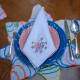 Individuales Posada en Lino Blanco con Bordado de Piñata de Colores. Set de 4