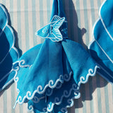 Set de 4 Servilletas Turquesa con Bordado de Olas - La Mar