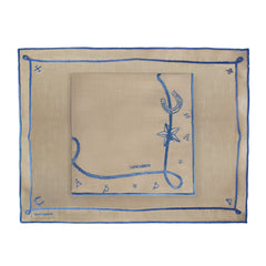 Mantelería Cowgirl con Individuales y Servilletas en Lino Caramelo con Bordado Azul. Set para 4 personas.