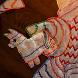 Individuales Posada en Lino Blanco con Bordado de Piñata de Colores. Set de 4