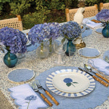 Servilletas Big Daisy en Lino Blanco con Bordado de Flor en Azul . Set de 4