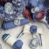 Servilletas Sofía en Lino Blanco con Bordado Azul. Set de 4