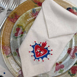 Servilletas Milagritos con Bordado de Corazón con Resplandor Azul en Lino Arena. Set de 4.