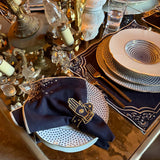 Servilletero Talismán en Lino Azul Marino con Bordado Dorado. Set de 4