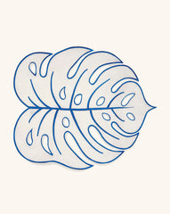 Individual Tropic de Hoja en Lino Arena con Orilla Bordada en Azul. Set de 4