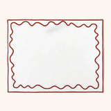 Individuales Regina en Loneta Blanca con Ondas Bordadas en Rojo. Set de 4