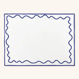 Juego de 4 Manteles Individuales Regina en Loneta Blanca con Ondas en Azul.