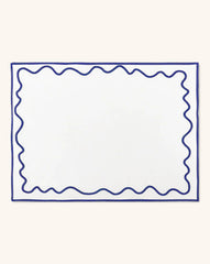 Juego de 4 Manteles Individuales Regina en Loneta Blanca con Ondas en Azul.