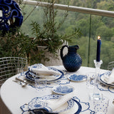 Set de Mantelería Identidad con Individuales, Servilletas y Coasters en Lino Blanco con Bordado en Azul . Set para 4 personas
