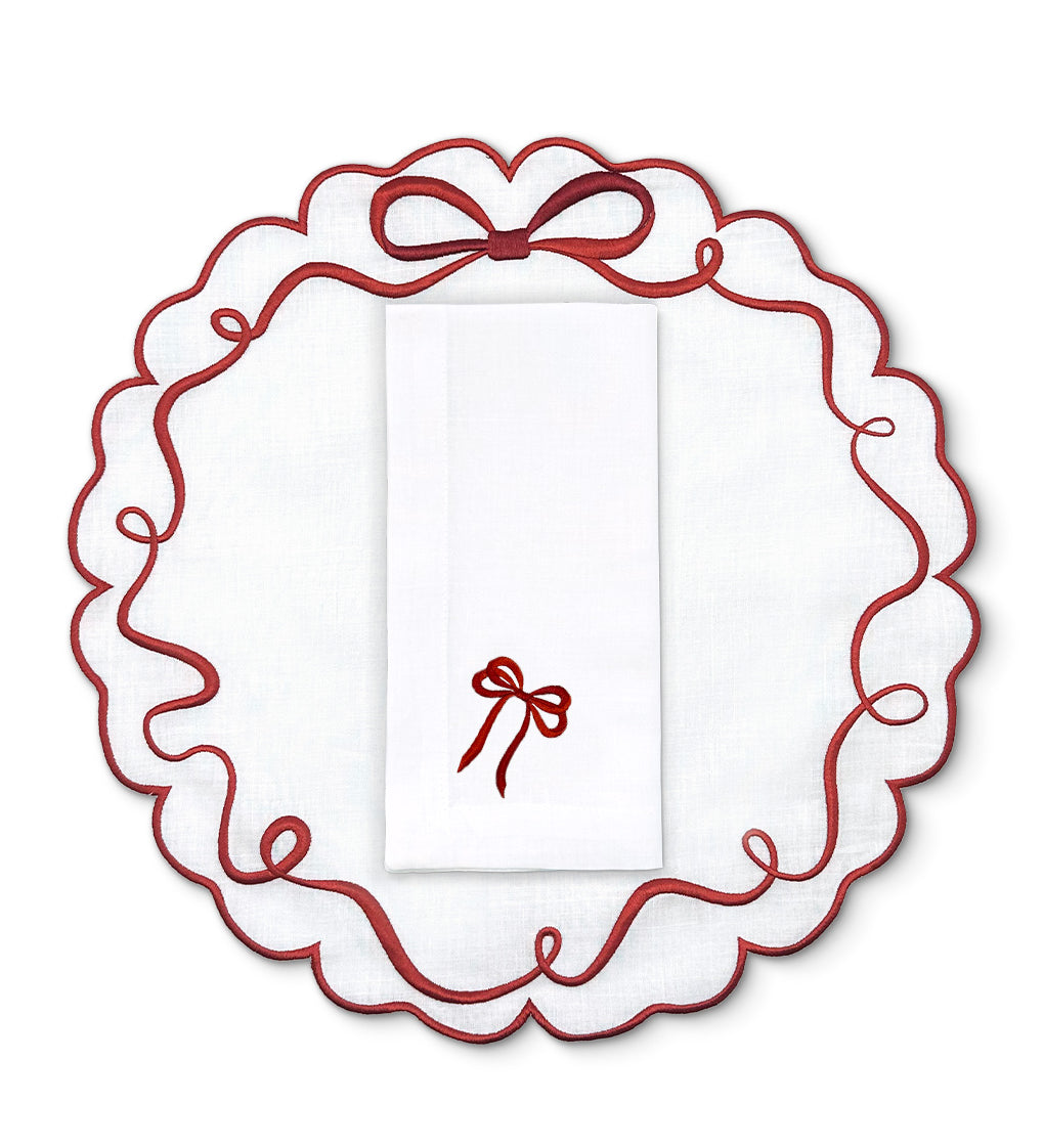 Set de mantelería blanca con moño rojo navideño, marca Zash