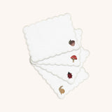 Cocteleras Fall en Lino Blanco con Bordado de Catarina, Bellota, Caracol y Hongo. Set de 4