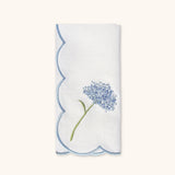 Set de Manteleria Flor Hortensia en Loneta Azul con Servilleta de Lino Bordado en Azul. 8 piezas