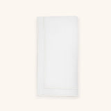 Servilletas Jimmy en Lino Blanco con Bordado Ivory. Set de 4