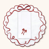 Set de Mantelería Red Bow con individuales y Servilletas en Lino Blanco con Bordado de Moño Rojo. Set para 4 personas