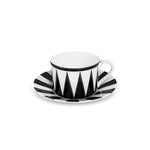 Taza de té con platito de porcelana blanca con rayas negras, de la colección Identidad diseñada por Sofia Aspe Interiorismo para Zash