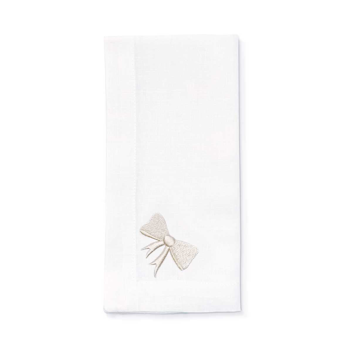 Servilleta de lino blanco con moño bordado en ivory, marca Zash