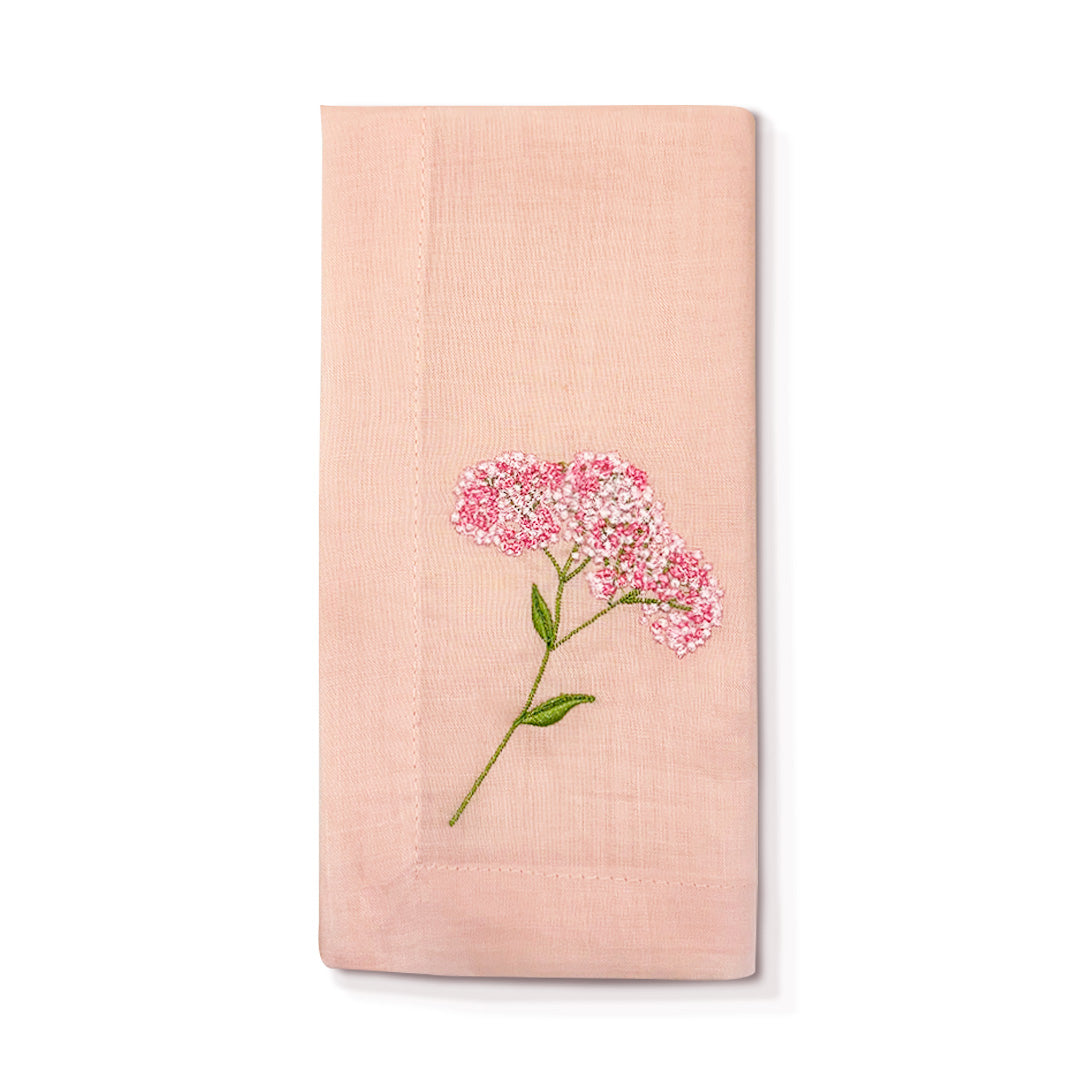 Servilleta de Lino color rosa claro con flor rosa bordada, marca Zash