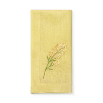 Servilleta de lino en color amarilla con bordado de flor amarilla, marca Zash