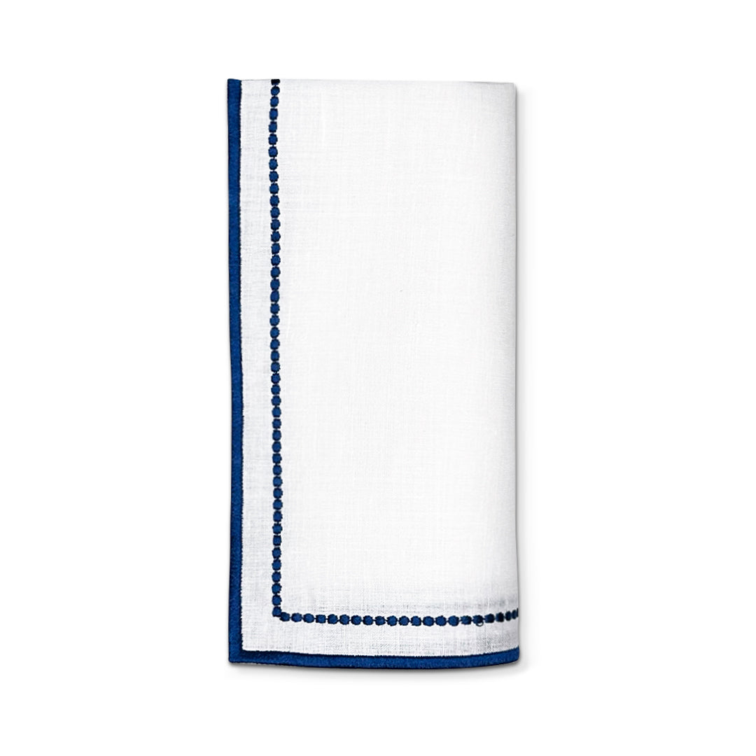 Servilleta Sofía de Lino blanco con doble orilla bordada en azul, marca Zash
