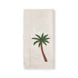 Servilletas de lino color arena con palmera bordada, marca Zash