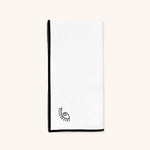 Servilleta de Lino con Orilla en Negro y Ojo Bordado