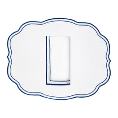 Mantelería Sofía con Individual y Servilleta en Lino Blanco y Bordado en Azul. Set para 4 personas