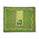 Set de Mantelería con Individuales y Servilletas en 4 colores con una serpiente bordada, marca Zash